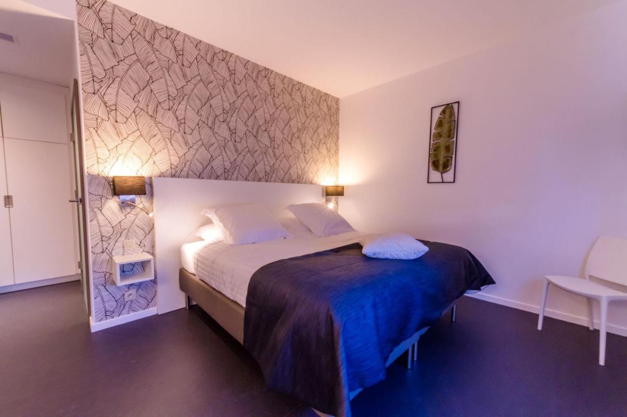 Manavahotel Herstal Bagian luar foto